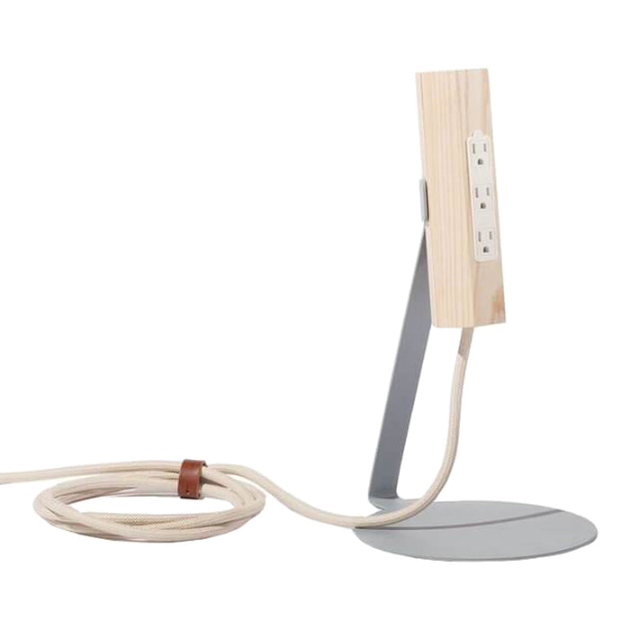 Modern lamp featuring a natural wood finish, gray metal base, and cream-colored cord for a sleek, minimalist look.
