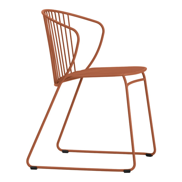 Rust-orange metal chair with sleek, modern lines and a stylish wire design. Perfect for contemporary decor.