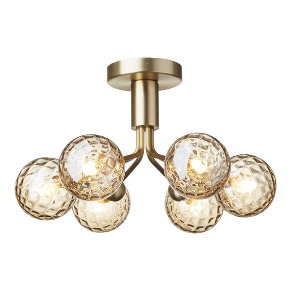 "Brass ceiling light fixture with five textured glass globes in warm amber tones, adding modern elegance to any space."