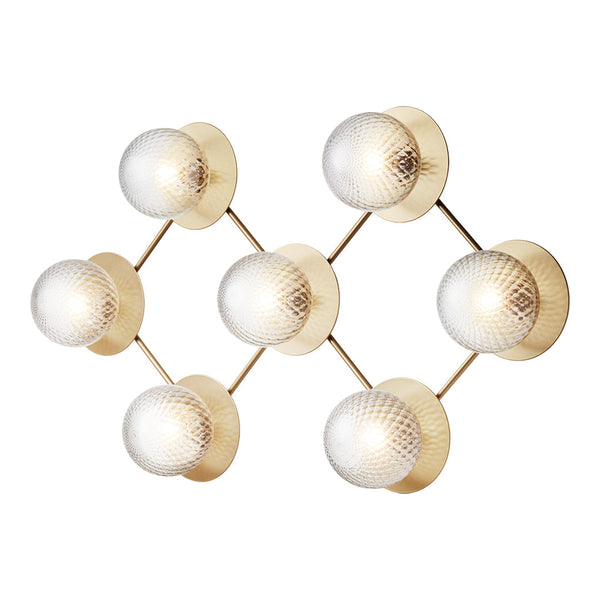Gold and glass wall light with six spherical shades and geometric pattern, adding elegance to modern decor.