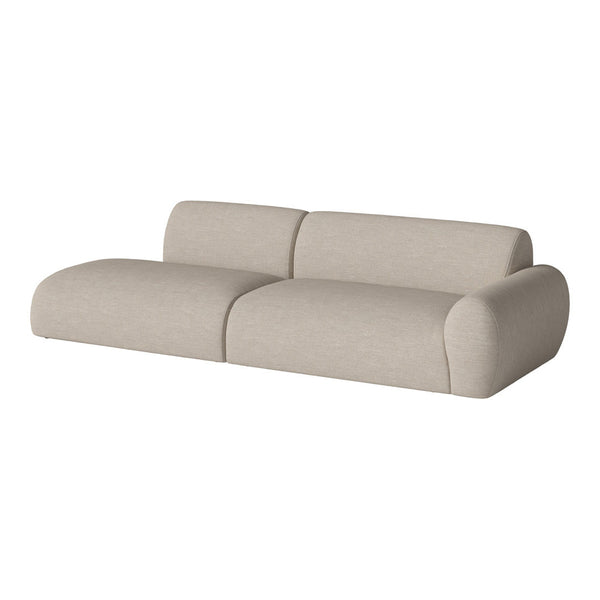 Light beige modern sectional sofa with a textured fabric and soft curved lines for a cozy living space.