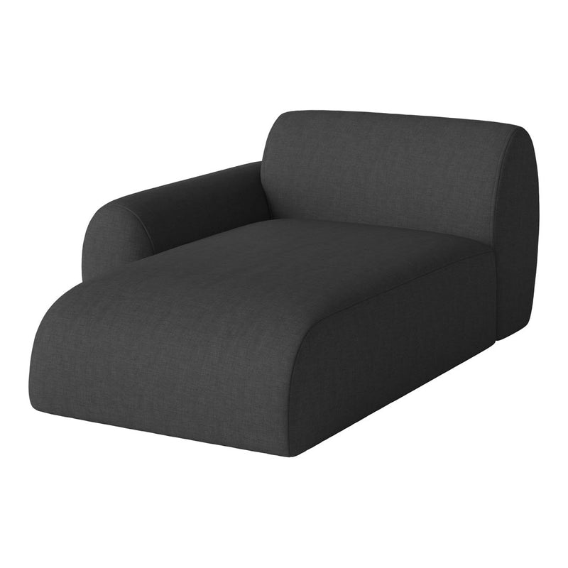 Modern dark gray chaise lounge with a sleek, minimalist design and a soft fabric texture. Perfect for stylish interiors.
