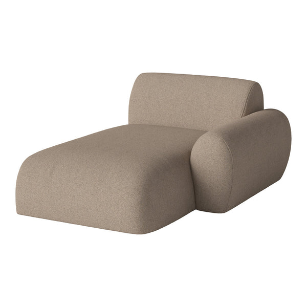 Soft beige chaise lounge with a smooth, curved design and subtle textured upholstery. Perfect for modern interiors.