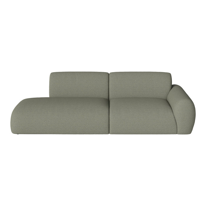 Light olive green sofa with a smooth, textured fabric and modern, curved design, perfect for contemporary spaces.