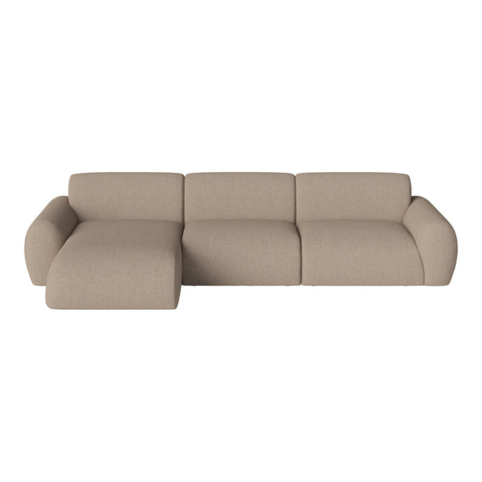 Sleek beige sectional sofa with a textured upholstery and smooth curved lines, perfect for modern living spaces.