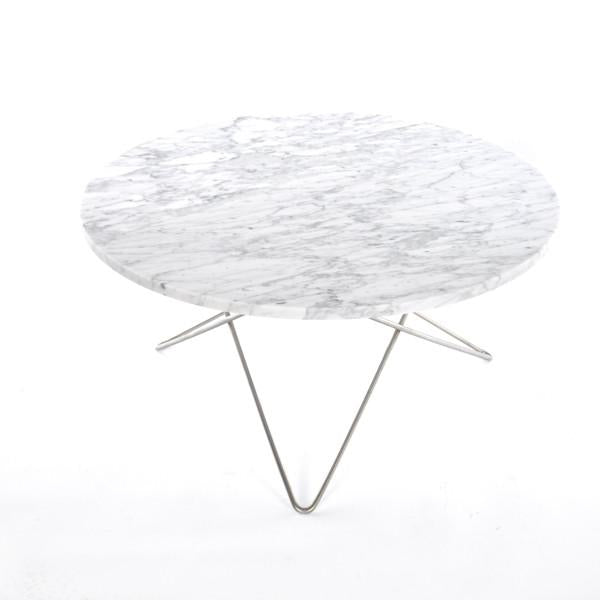 White marble tabletop with subtle gray veining, supported by a modern silver tripod base.