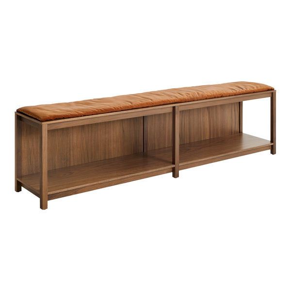 Wooden bench with a warm brown leather cushion, featuring rich walnut tones and a smooth, modern finish.