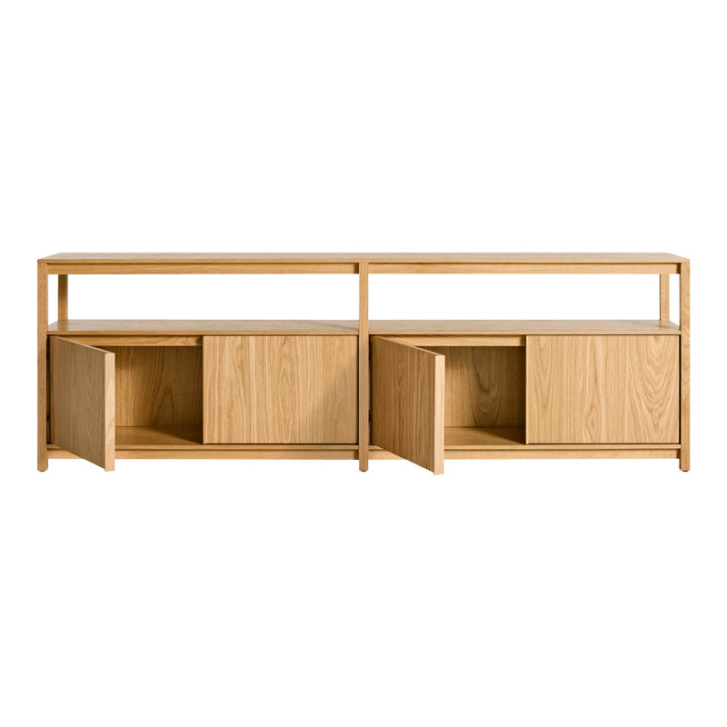 Natural wood TV stand in light oak with simple, modern design and two open shelves, featuring minimalist cabinet doors.