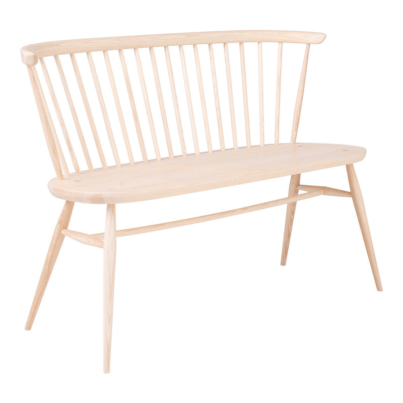 Light natural wood bench with a sleek spindle back and smooth, minimalist design. Perfect for modern decor.