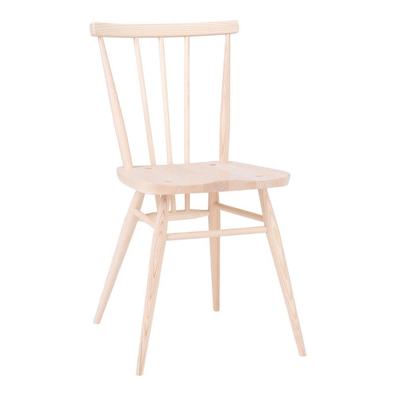 Light wooden chair with natural grain pattern, featuring minimalistic design and soft beige hues.