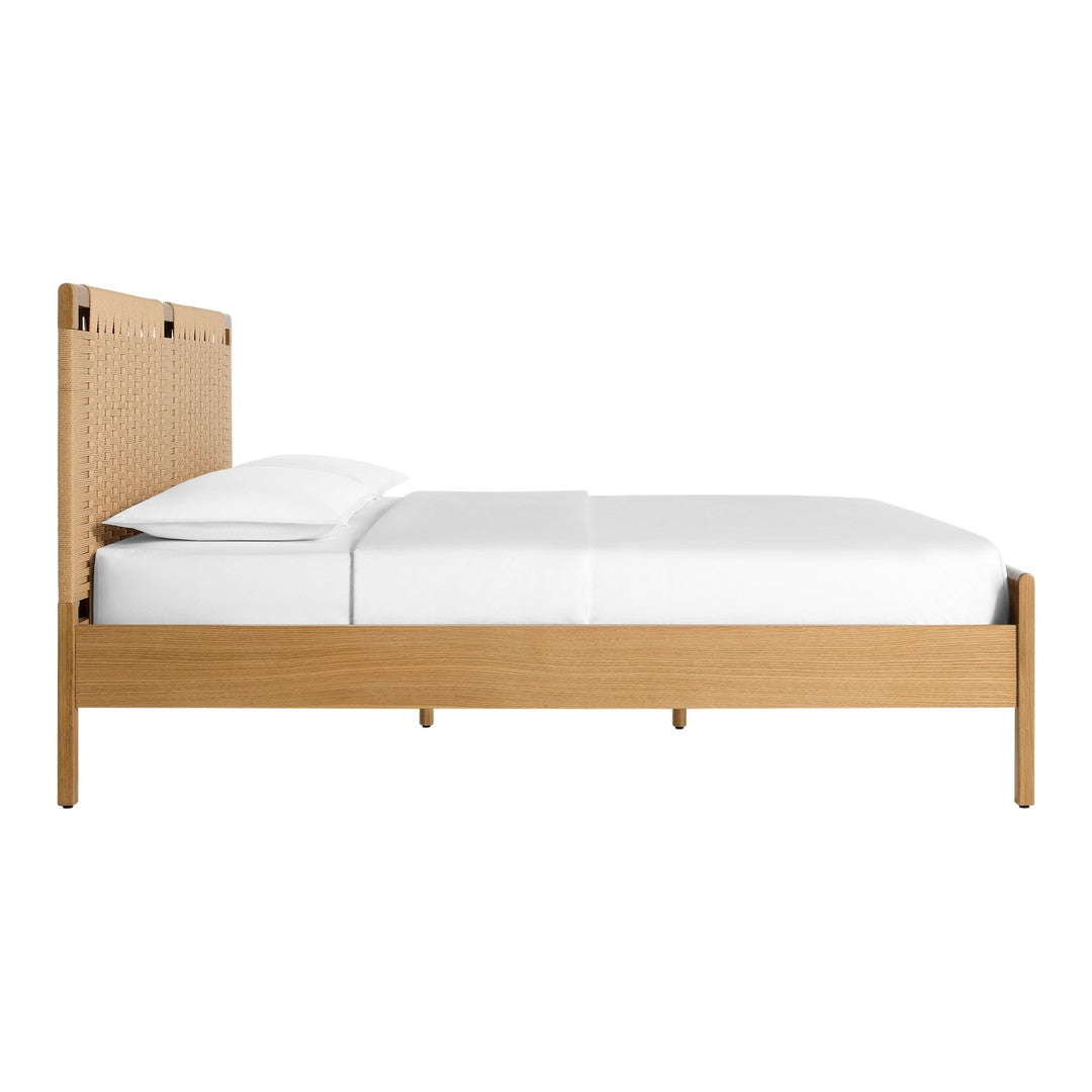 Light wood bed frame with woven pattern headboard and crisp white bedding. Modern and minimalist design.