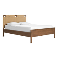 Natural wood tones with a woven tan fabric headboard and white bedding create a cozy, modern aesthetic.
