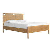 Natural wood tones with a woven rattan headboard, accented by crisp white bedding for a serene look.