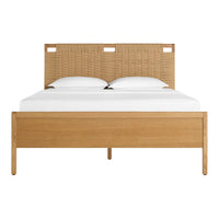 Natural wood bed frame with a woven tan headboard and crisp white bedding, highlighting earthy tones and modern design.