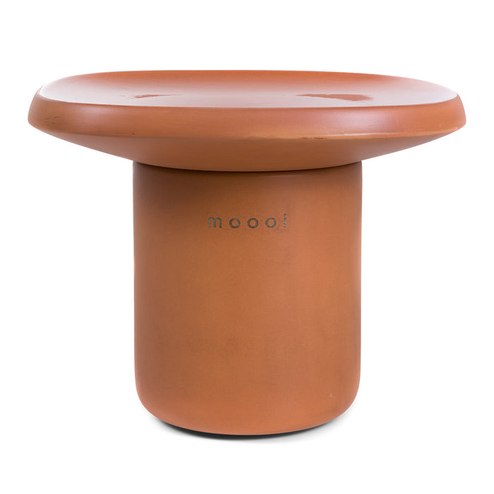 Terra-cotta table with a smooth, round top and cylindrical base, offering a modern minimalist design.