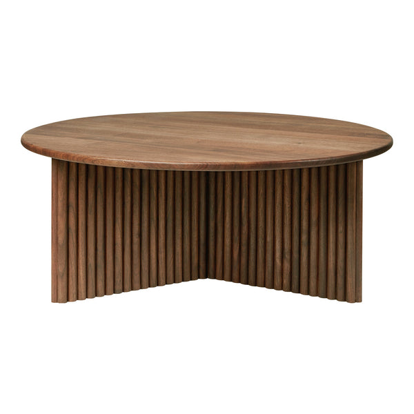 Round wooden coffee table in rich brown with vertical ribbed base and smooth top surface. Modern and stylish design.