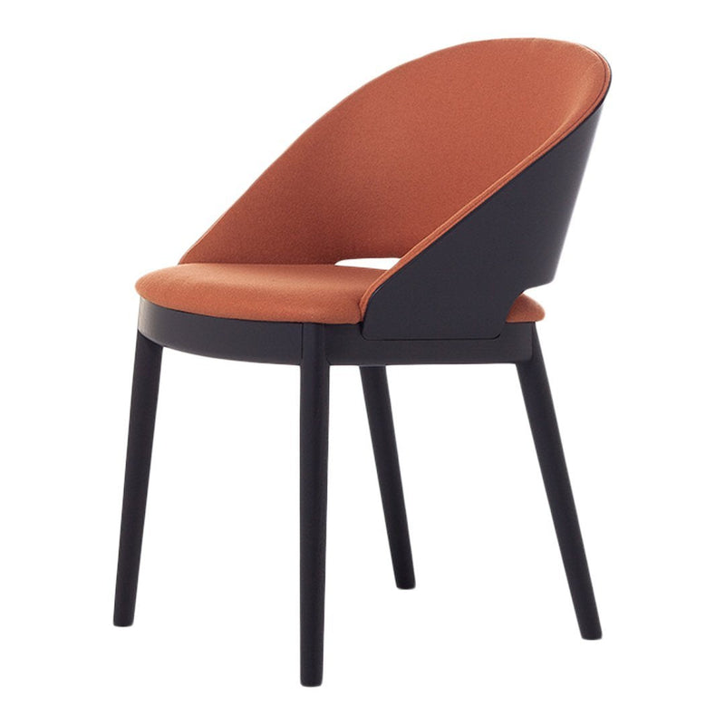 Modern chair featuring a warm terracotta seat and sleek black wooden legs, with a smooth, minimalist design.