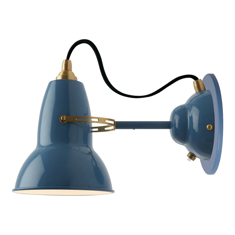 Blue metal wall lamp with brass accents and a sleek black cord, featuring a modern, minimalist design.