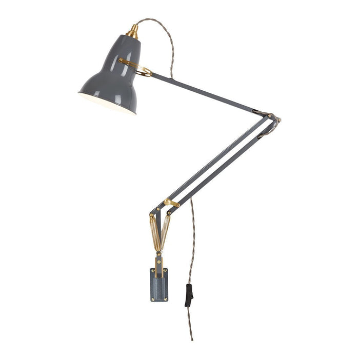 Gray and gold adjustable desk lamp with a sleek design and industrial accents, perfect for modern decor.