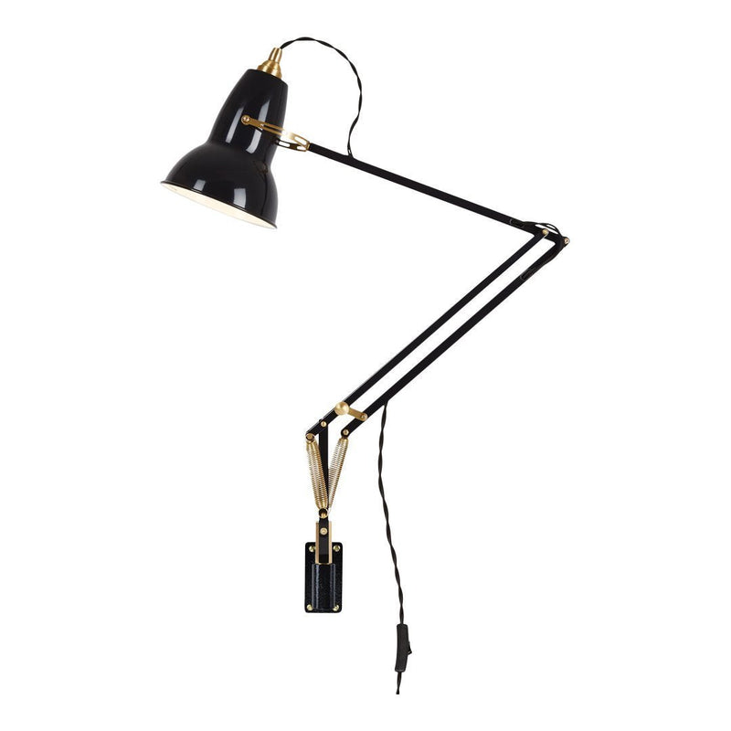 Black and gold adjustable desk lamp with sleek, modern design and minimalistic pattern. Perfect for any workspace.
