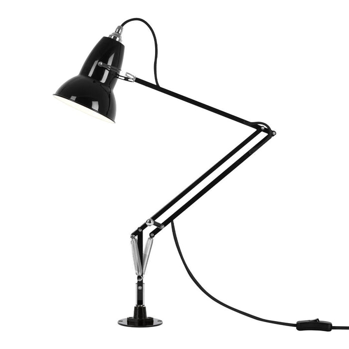 Black adjustable desk lamp with a sleek chrome finish and minimalist design. Perfect for modern decor.