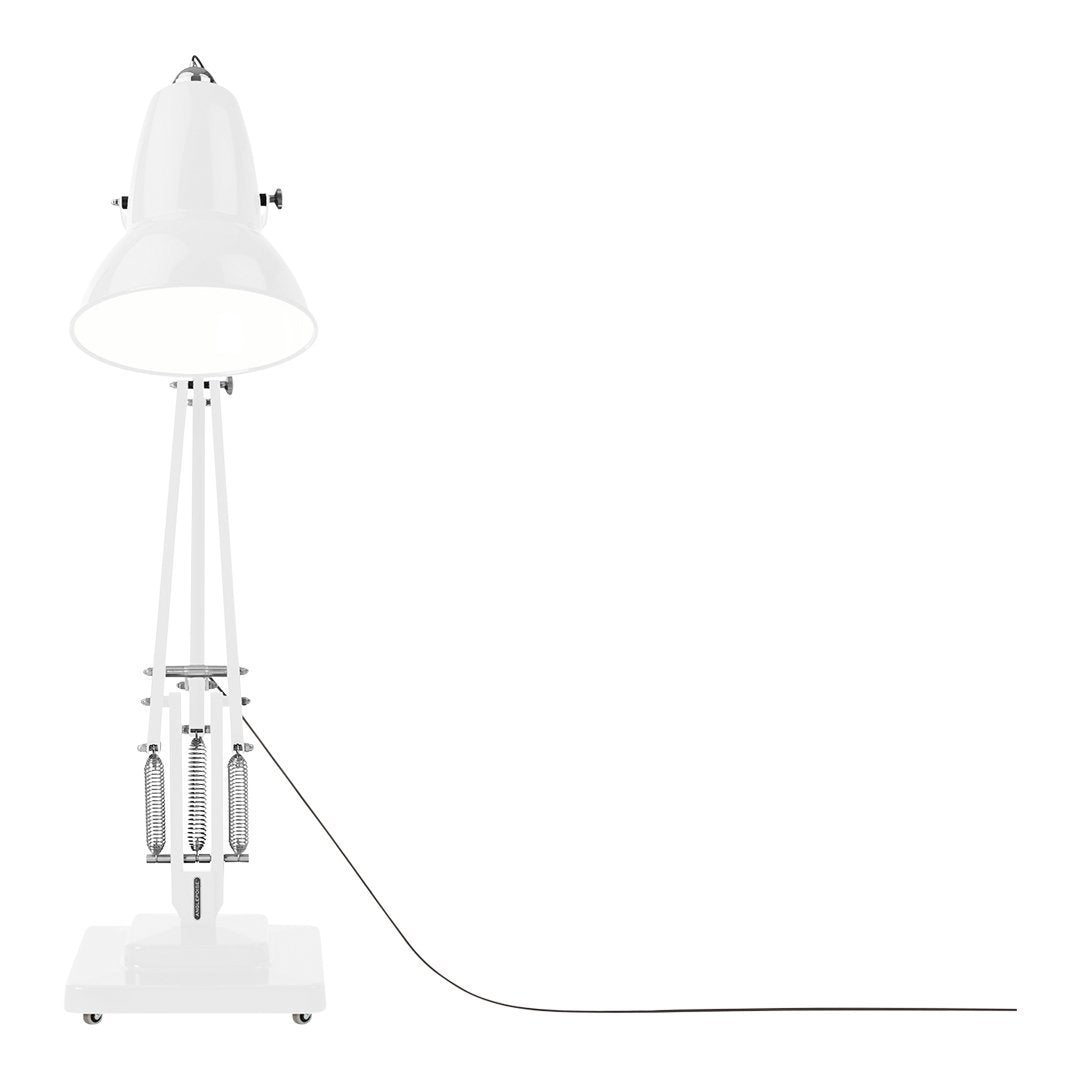 White industrial-style lamp with a sleek design and a minimalist base. Features a smooth bell-shaped shade.