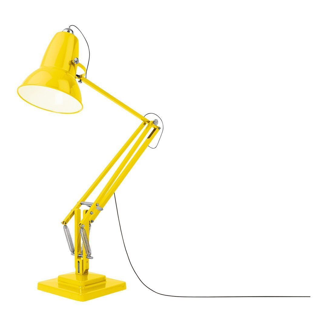 Bright yellow adjustable desk lamp with a modern design and sleek lines, perfect for adding a pop of color.