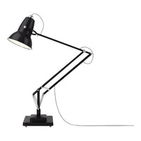 Black adjustable desk lamp with sleek metallic arms and a minimalist design; perfect for modern decor.