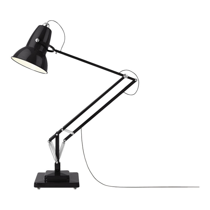 Black adjustable desk lamp with sleek metallic arms and a minimalist design; perfect for modern decor.