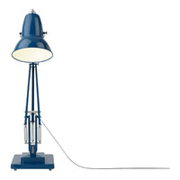 Blue metal floor lamp with a sleek, modern design and glossy finish, featuring clean lines and industrial accents.