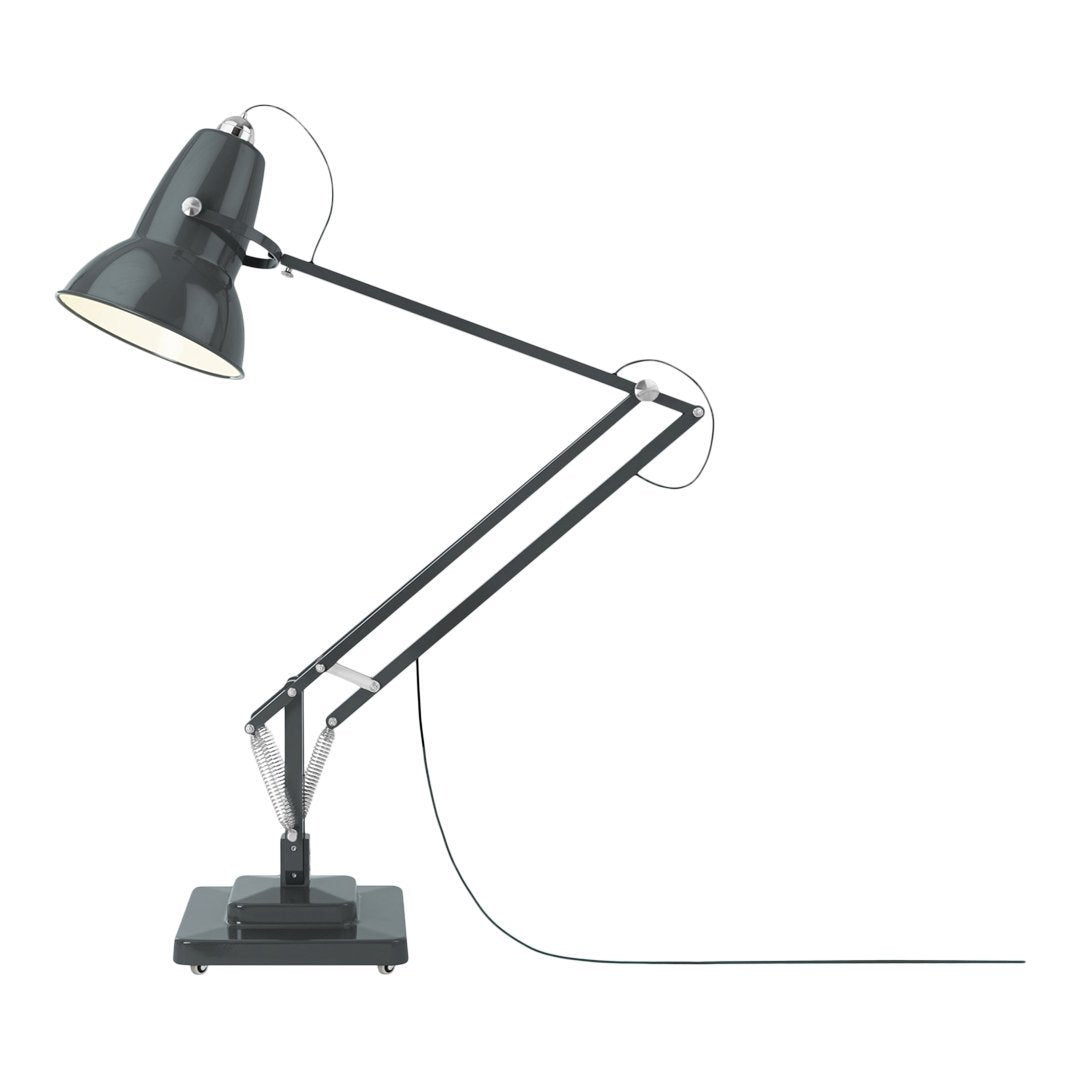 Black and gray adjustable desk lamp with a sleek, industrial design and clean lines. Classic monochromatic color scheme.