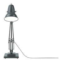 Industrial-style gray desk lamp with a shiny metal shade and black cord on a square base.