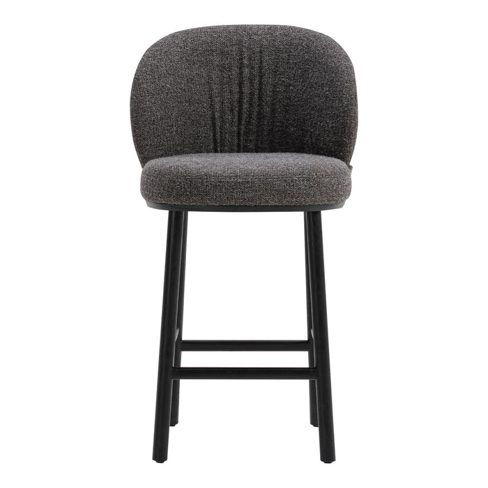 Gray upholstered bar stool with a textured fabric seat and sleek black legs. Perfect for modern interiors.