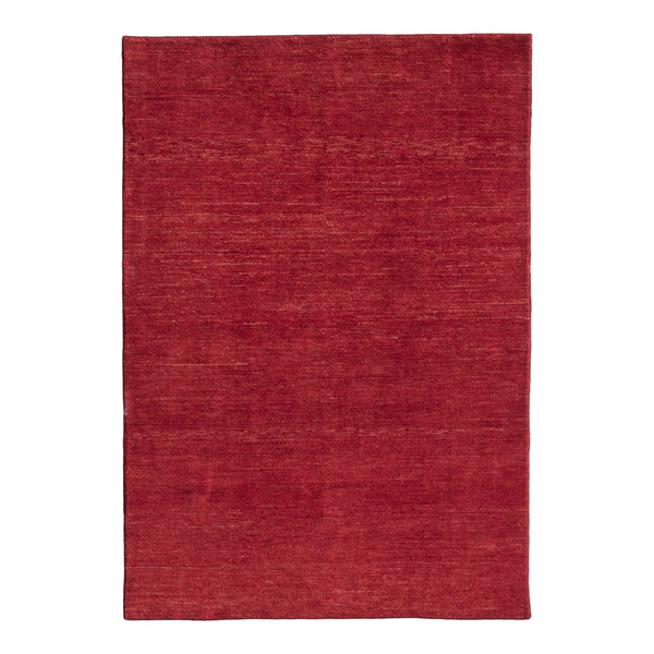 Solid red area rug with a subtle texture, adding warmth and depth to any room decor.