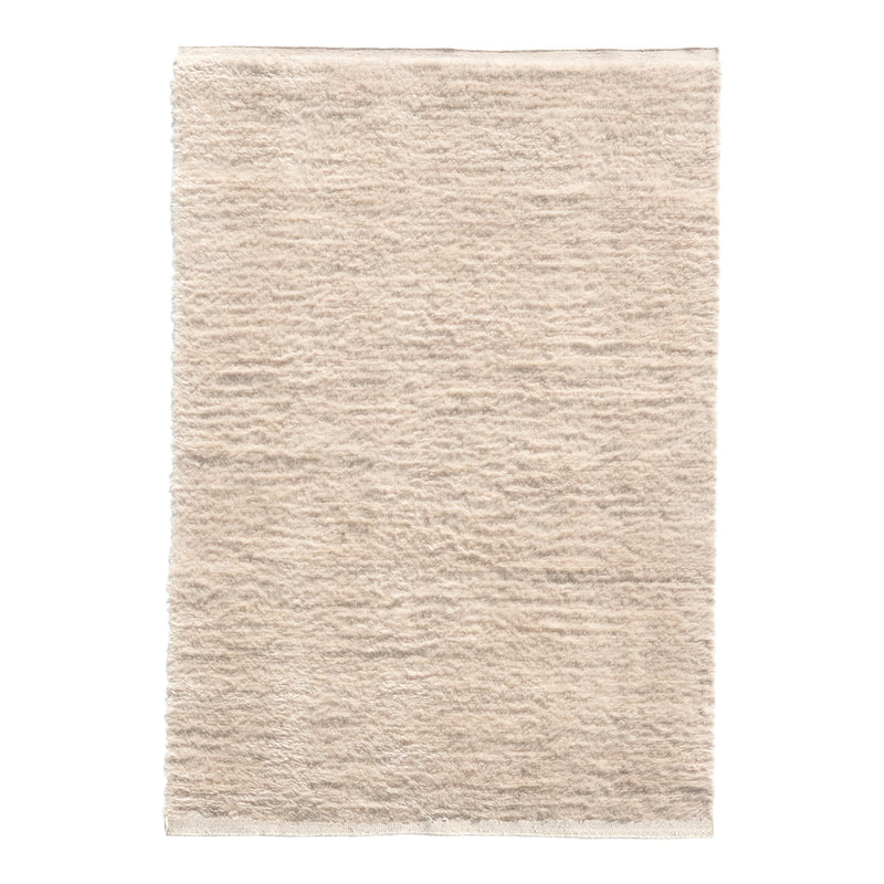 Textured beige rug with subtle tonal variations and a soft, woven pattern. Ideal for neutral-themed decor.