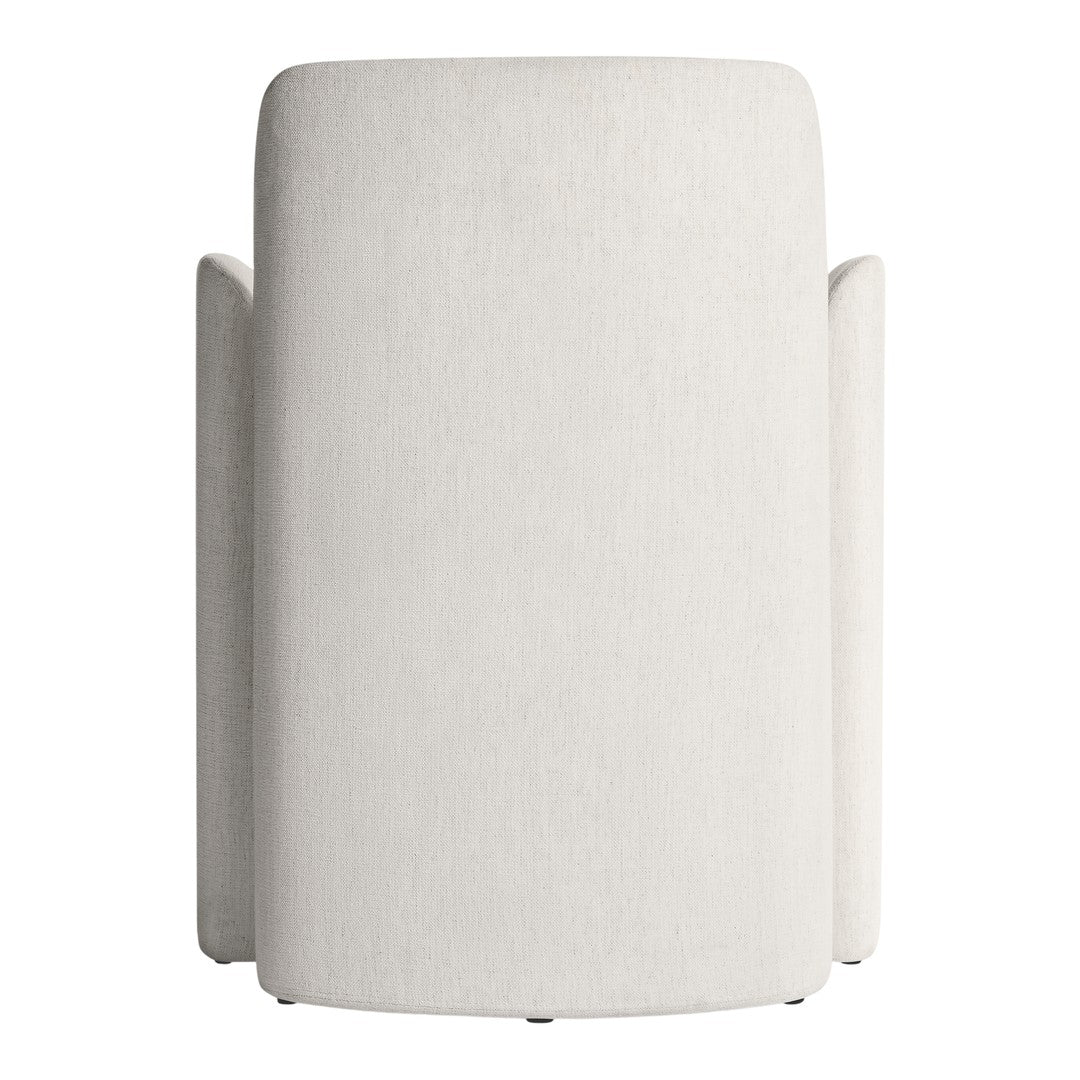 Textured cream fabric armchair with a minimalistic design and soft, neutral color palette.