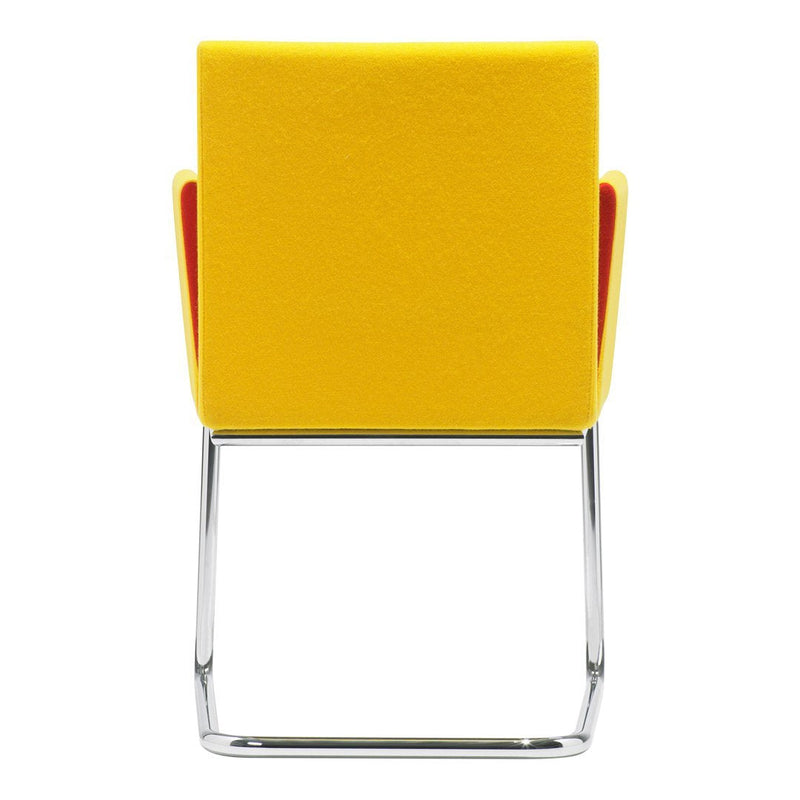 Bright yellow chair with red accents on a sleek chrome frame, showcasing a modern geometric design.