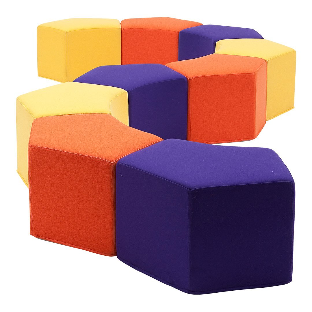 Colorful hexagonal cushions in vibrant shades of yellow, orange, red, and purple, featuring a playful pattern.
