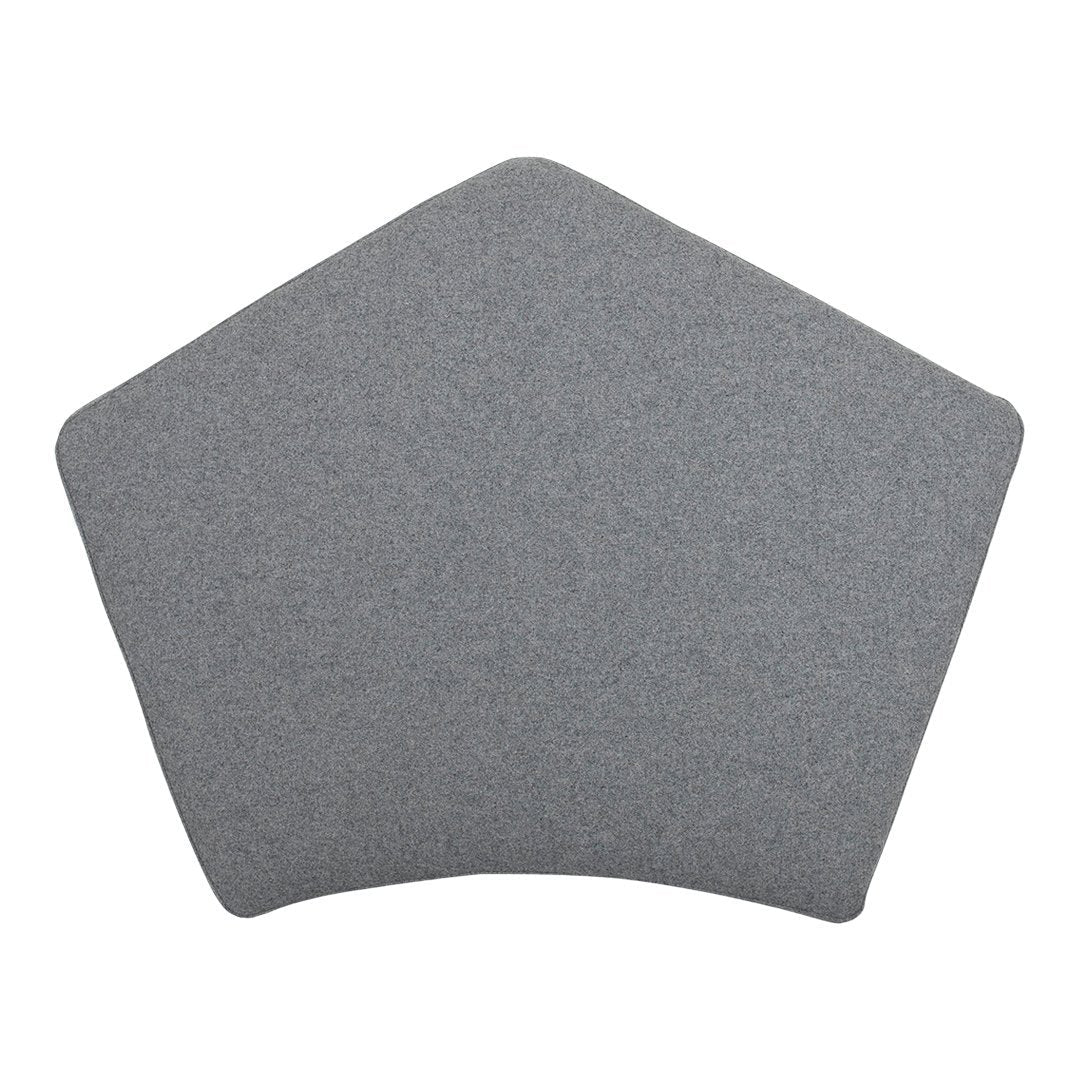 Gray pentagonal cushion with a smooth, textured surface, perfect for modern decor.