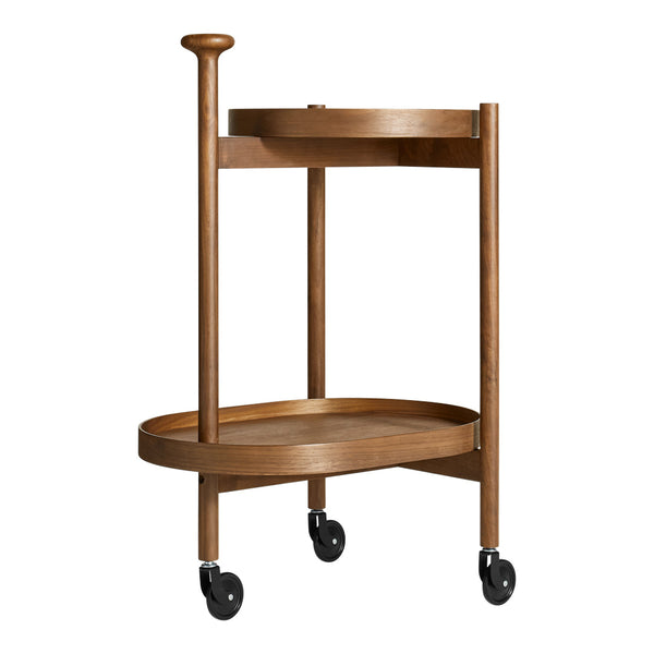 Wooden serving cart in warm brown tones with a smooth finish and simple, circular design. Features wheels for mobility.