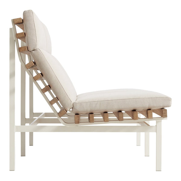 Modern white lounge chair with natural wood accents and neutral cushions, featuring a minimalist design and open pattern.
