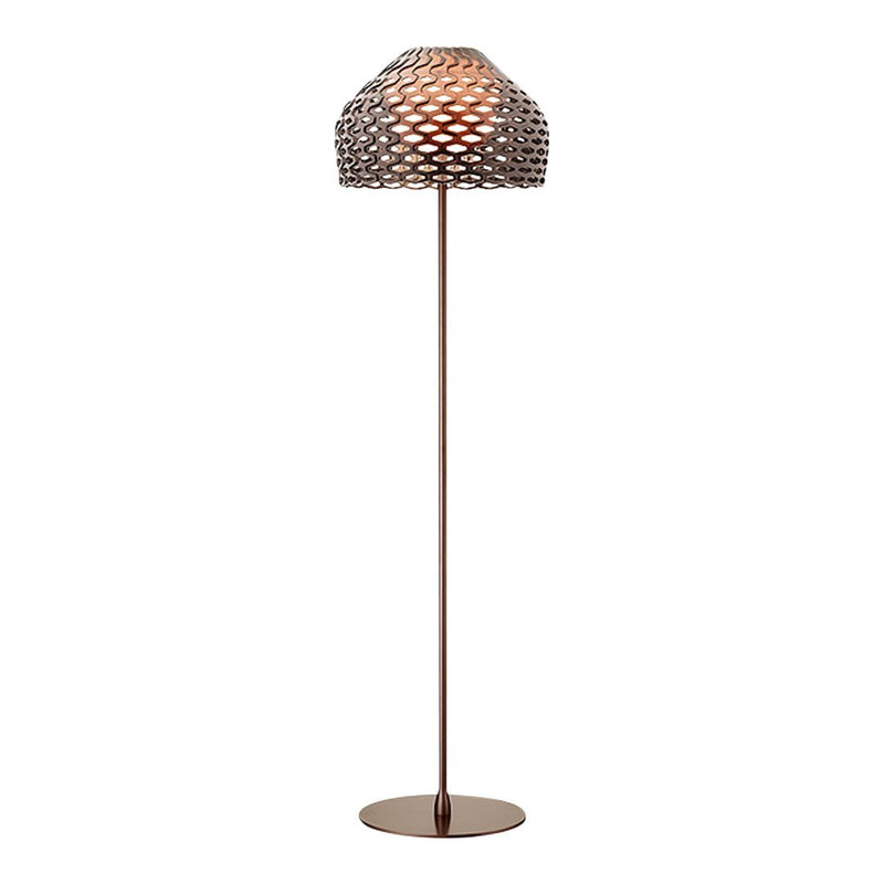 Bronze floor lamp with a geometric woven shade, featuring intricate patterns and warm lighting for a stylish ambiance.