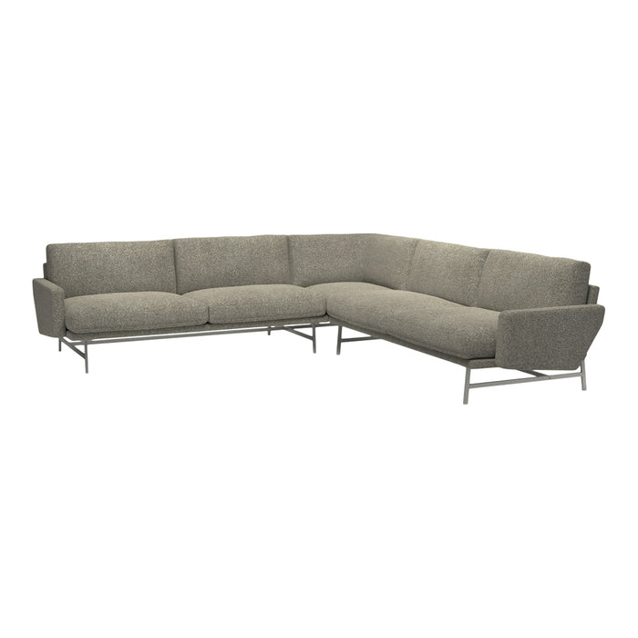 L-shaped sectional sofa in a neutral gray fabric with subtle texture and modern metallic legs.
