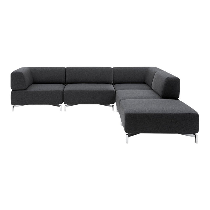 Contemporary black sectional sofa with a minimalist design and smooth fabric upholstery, complemented by sleek chrome legs.