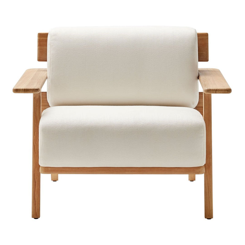 Cream-colored fabric armchair with natural wood accents, featuring a minimalist design and clean lines.