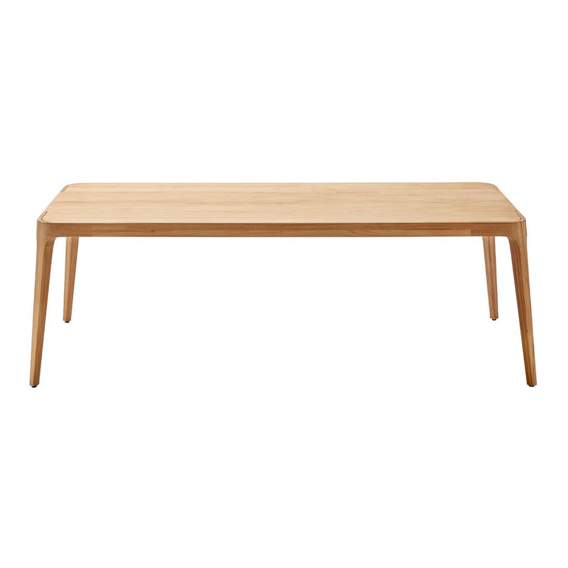 Natural wood coffee table in light oak finish with smooth, minimalist design and clean lines. Perfect for modern decor.