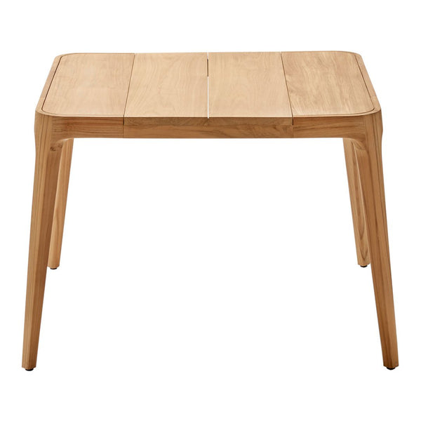Light natural wood dining table with a smooth finish and subtle grain pattern. Rectangular design with rounded edges.