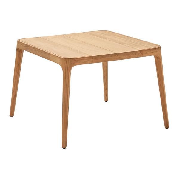 Natural light wood square table with smooth surface and minimalist design, featuring warm oak tones and subtle grain patterns.