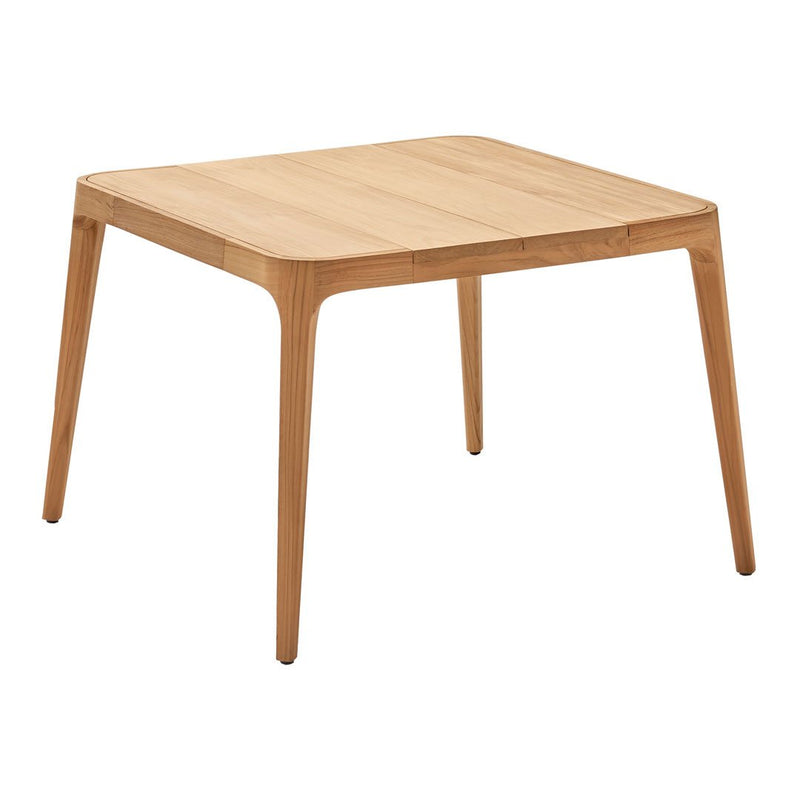 Natural light wood square table with smooth surface and minimalist design, featuring warm oak tones and subtle grain patterns.