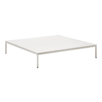 Sleek white square coffee table with minimalist design and metallic legs, perfect for modern decor.